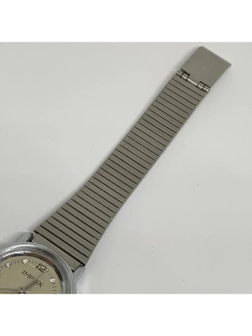 Vintage Impex mechanical wind up women’s watch 23mm japan silver tone works